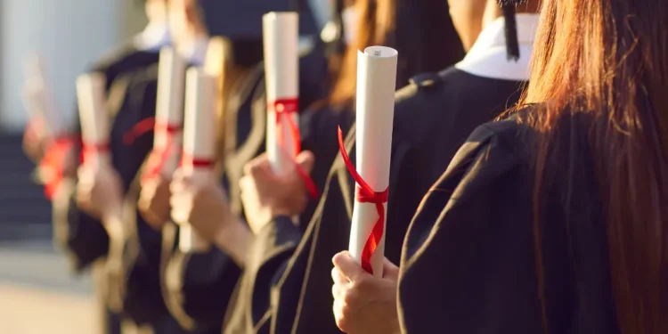 Graduates holding diplomas as St Lucia probes Formato School Executive MBA certification concerns