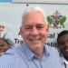 Allen Chastanet takes a photo with students from the St Lucia School of Innovation Class of 2025
