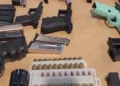 Seized firearms and ammunition displayed after Castries port gun seizure in St Lucia