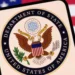 Trump travel ban 2025 with U.S. State Department seal and American flag