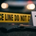 Dennery shooting spree scene with police tape, handgun, and evidence marker after Kennedy Leon’s fatal shooting.