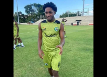 Sherman Augustin stabbed to death during Carnival in Vigie, pictured in green FC football uniform