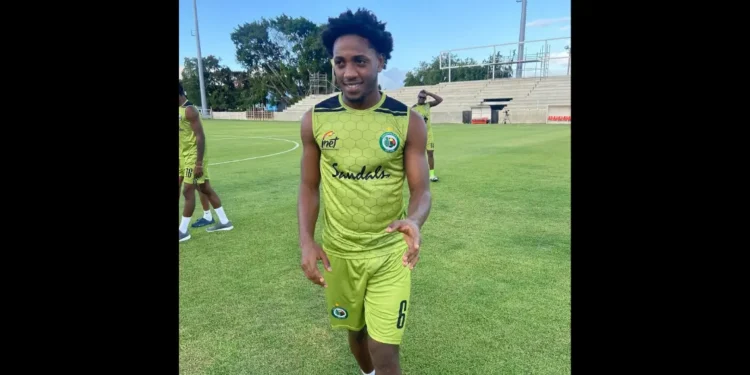 Sherman Augustin stabbed to death during Carnival in Vigie, pictured in green FC football uniform