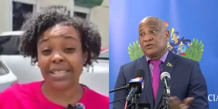 Assault on female journalist Eldrise Charles pictured with St Lucia Minister Ernest Hilaire during controversy
