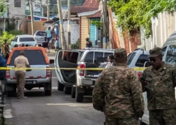 Police cordon off crime scene in city center during Castries homicide investigation