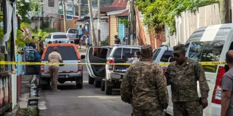 Police cordon off crime scene in city center during Castries homicide investigation