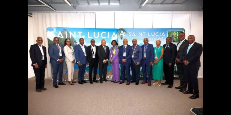 Part of the St Lucia Japan trip delegation posing in Osaka, with government officials and agency heads criticized for taxpayer-funded spending.
