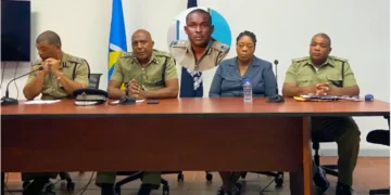 Press conference on St Lucia senior cop sexual misconduct case with inset of accused officer.
