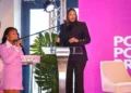 Teri Helenese in black inspires unity at Caribbean POSH Weekend keynote on women’s empowerment