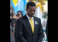 UWP candidate Rosh Clarke attends a funeral service in Castries, St Lucia