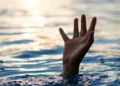 Illustration of hand above water during suspected drowning where Wilter Joseph found dead in Bexon River.