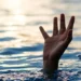 Illustration of hand above water during suspected drowning where Wilter Joseph found dead in Bexon River.