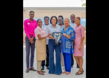 Janelle Hopkin and Lady Betty Hopkin celebrate AAA Five Diamond Award with Spice Island Beach Resort team in Grenada