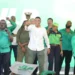 Andrew Holness secures third term as JLP wins nail-biting election, celebrating with supporters in Jamaica.