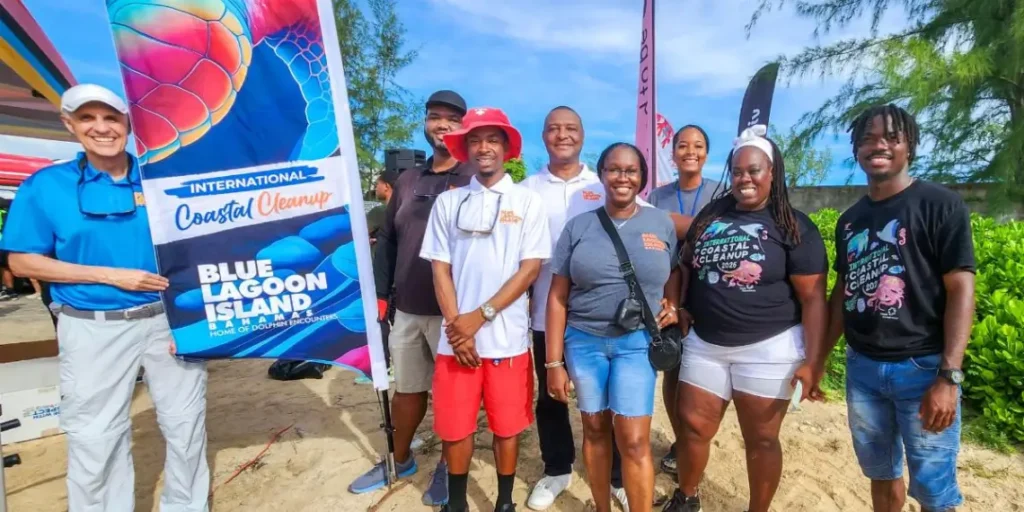 Blue Lagoon Island coastal cleanup team at Yamacraw Beach, marking 40 years of volunteer action in The Bahamas.