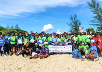 Volunteers gather at Yamacraw Beach for the Blue Lagoon Island coastal cleanup, marking 40 years of community action against marine debris.