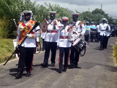 Police band leads military parade honoring K9 Constable Tyson at funeral in Vieux Fort St Lucia