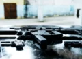 Black machine gun on the table, used as an illustration representing firearms seized during the St Lucia police operation in Barnard Hill.