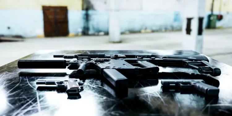 Black machine gun on the table, used as an illustration representing firearms seized during the St Lucia police operation in Barnard Hill.