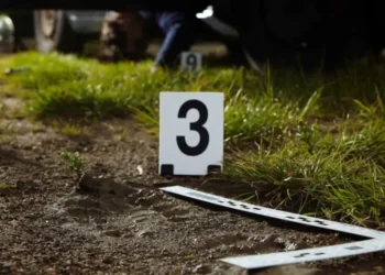 Crime scene markers at Vigier where police investigate triple homicide Vieux Fort.