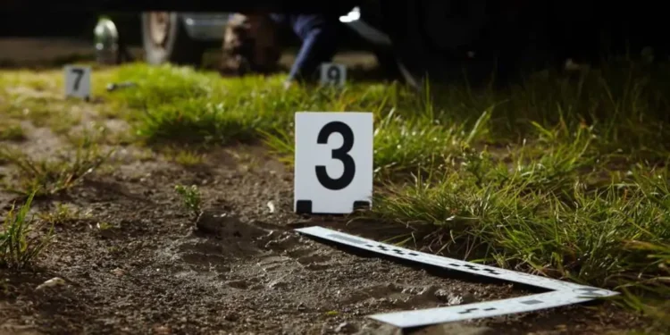 Crime scene markers at Vigier where police investigate triple homicide Vieux Fort.