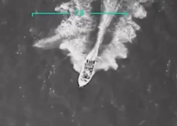 Aerial surveillance image shows US strike on Venezuelan drug boat in Caribbean waters before it was destroyed, killing 11