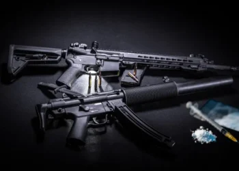 Stock image of assault rifles, ammunition and narcotics representing Vieux-Fort police raid in St Lucia
