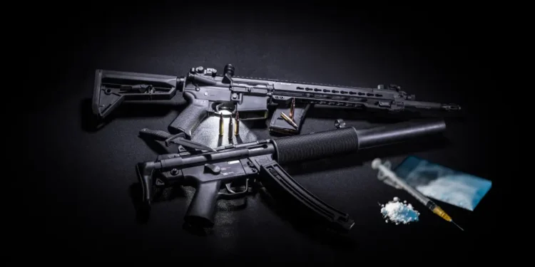 Stock image of assault rifles, ammunition and narcotics representing Vieux-Fort police raid in St Lucia