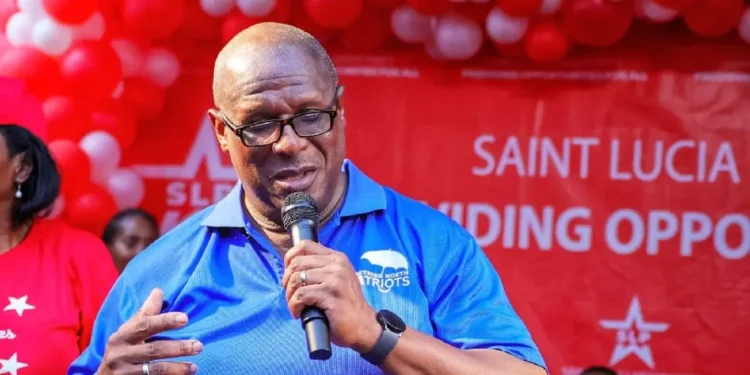 Stephenson King betrays La Clery: King speaking into a microphone in Castries