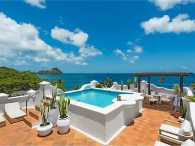 Rooftop pool and oceanfront terrace at Cap Maison Resort & Spa in Cap Estate, St Lucia – Forbes ranks best resorts in St Lucia