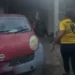 Marcella Johnson running towards the Gros Islet house fire scene during campaign motorcade