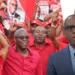 Philip J Pierre and Stanley Felix amid Labour Party crowd in Saint Lucia following betrayal remarks controversy.