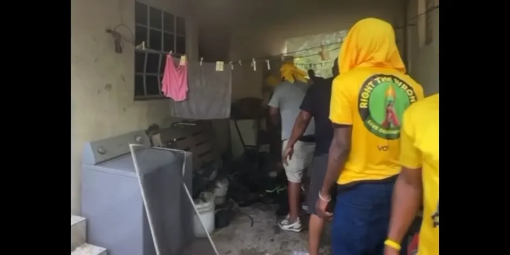 UWP supporters containing the Gros Islet house fire during campaign motorcade