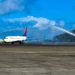 A Delta aircraft receives a water salute on arrival at Argyle International Airport during the Delta inaugural flight to St Vincent.