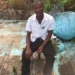 A man later killed in a fatal stabbing in Dennery Village is seen seated outdoors in an undated photo.
