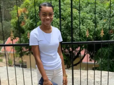 Dayna Tobierre is pictured in white t shirt