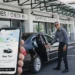 Uber launches in St Lucia as a taxi driver waits at an airport while a ride is booked on a mobile app