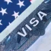 US visa bonds highlighted on a United States visitor visa document amid travel policy concerns