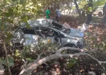 Damaged vehicle off the roadway following the Beanfield Vieux Fort accident