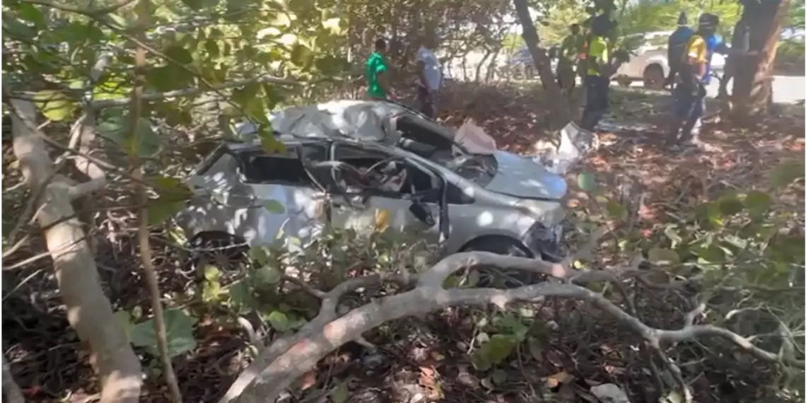 Damaged vehicle off the roadway following the Beanfield Vieux Fort accident