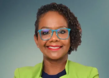 Portrait of political commentator Minerva Ward responding to debate over United Workers Party silence