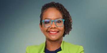 Portrait of political commentator Minerva Ward responding to debate over United Workers Party silence