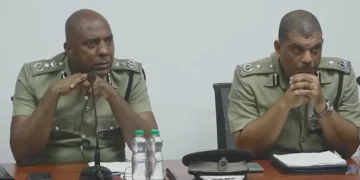 Royal Saint Lucia Police Force officials address the media during a press conference on the gun amnesty