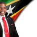 Prime Minister Terrance Drew portrait with St Kitts and Nevis flag, St Kitts and Nevis US deportees story