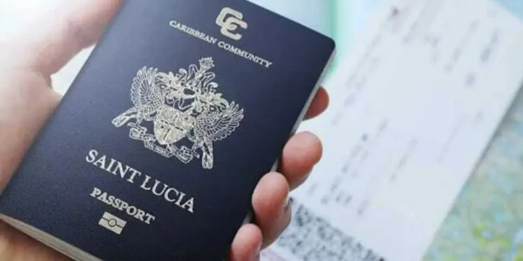 St Lucia passport upgrade illustrated by Saint Lucian passport in hand