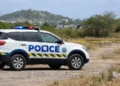 Police vehicle in the Beanfield area of Vieux Fort where a decomposing body found in Vieux Fort is under investigation