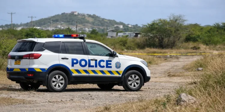 Police vehicle in the Beanfield area of Vieux Fort where a decomposing body found in Vieux Fort is under investigation