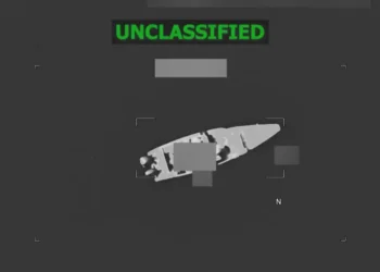 Unclassified aerial surveillance image released by SOUTHCOM showing vessel targeted in U.S. Strike Kills 3 maritime operation in the Caribbean.