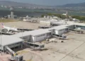 Aircraft parked at a Caribbean airport terminal as the Caribbean tourism decline impacts arrivals