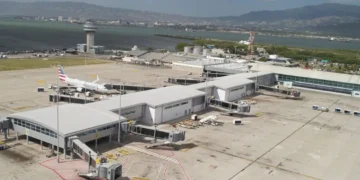 Aircraft parked at a Caribbean airport terminal as the Caribbean tourism decline impacts arrivals